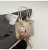 Verano 2025 Bolso Cuadrado Pequeño Exquisito Simple de Alta Calidad de Mano para Desplazamiento Versátil para Mujer Bolso de Hombro Tipo Cubo Bandolera