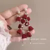 Brincos de Pérola com Laço Vermelho para Outono e Inverno Brincos de Luxo Femininos 2025 Novo Estilo Chinês Brincos Vermelhos