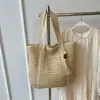 Bolso de hombro tejido para playa de gran capacidad y versátil, nuevo bolso de paja de color liso para vacaciones junto al mar, bolso de mano