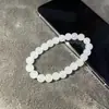 Pulsera de Perlas Redondas de Imitación de Jade Blanco Hotan de 10 mm Pulsera Clásica de Vidrio Tienda de Oro Punto Turístico en Vivo Fábrica de Drenaje Outlet