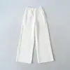 Ropa de Mujer al por Mayor Transfronteriza Estilo Europeo y Americano 2026 Nuevo Color Sólido Patchwork Tejido Cintura Forro Polar Pantalones de Chándal Pierna Ancha Pantalones Casuales