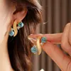 Aretes y Collar de Plata con Incrustaciones de Diamante y Turquesa Cadena para Clavícula Versátil de Moda Retro Lujo Ligero Nicho Conjunto de Alta Gama para Mujeres