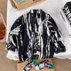 Nueva camisa casual de seda de hielo de manga larga estampada para niños y niñas, transpirable, con cuello de solapa de dibujos animados, fresca y guapa, para primavera y otoño