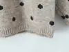 Ropa de mujer al por mayor transfronteriza 2026 otoño nuevo diseño nicho versátil moda suéter de punto jacquard de lunares