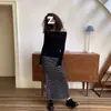 Falda Larga de Punto A-Line de Cintura Alta Rayada Negra para Mujer Otoño e Invierno 2025 Estilo Nuevo Engrosado Falda Larga Casual