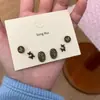 Pendientes de Dibujos Animados Coloridos Lindos Versátiles Traje Exquisitos Pequeños Corazón de Niña Pendientes de Sentido de Diseño Único de Nicho