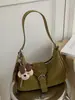 Bolso de moda transfronterizo estilo coreano 2026 otoño nueva moda bolso versátil tipo empanada para ir al trabajo, bolso de hombro y cruzado simple