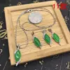 Colgante de jade malayo al por mayor, colgante de calcedonia verde de Taiwán con incrustaciones de jade, collar de jade con incrustaciones de oro, lista de segundos, pequeño regalo