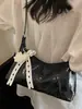 Bolso de axila de estilo coreano moderno para mujer 2025 Verano Nuevo Casual Simple Estilo Suave Bolso bandolera de un solo hombro