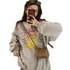 Moletom pullover com estampa de desenho animado retrô americano, gola redonda, para mulheres, novo estilo casual solto de outono 2026, sem capuz