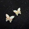 F136/G23 Aleación de Titanio Ópalo Marqués Mariposa Piercing Joyería Aretes de Aleación de Titanio Clavos para Labios Clavos para Hueso del Oído Venta al por Mayor