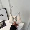 Bolsa de mão rosa com laço para menina 2024 nova moda nicho bolsa de ombro bolsa transversal com corrente