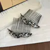 Pente de cabelo elegante com folha de strass preto para mulheres, novo acessório de nicho para coques na parte de trás da cabeça, grampo de cabelo requintado