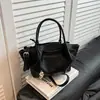 Bolso de mano único y elegante para mujer 2026 nueva moda patrón de lichi bolsa tipo cesta versátil para hombro y cruzado