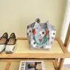 2026 Nova Bolsa Floral Primavera e Verão Bolsa de Tricô Feminina Bolsa de Grande Capacidade Moda Bolsa Tote para o Dia a Dia Bolsa de Presente