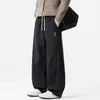 Pantalones deportivos de chándal de retazos deconstruidos con cintura elástica para hombre, pierna recta, corte holgado, tendencia otoño 2026, nuevos pantalones casuales