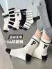 Nuevos calcetines deportivos de moda versátiles en blanco y negro para otoño e invierno, de longitud media, antipelusas, sin costuras, calcetines infantiles Clase A para niños y niñas
