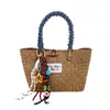 Bolsa de Palha Tecida Artesanal de Verão para Mulheres 2025 Nova Versátil Estilo Pastoral Bolsa de Mão Estilo Férias na Praia Bolsa de Palha