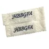 Etiqueta de collar de encaje personalizada con LOGOTIPO, etiqueta de tela bordada hueca soluble en agua, etiqueta de collar para lencería femenina, accesorios para ropa