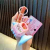 Llavero de trompeta mini para aliviar el estrés, colgante de trompeta de silbato mini, decoración para bolso, venta al por mayor de regalos pequeños