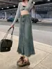 Falda vaquera estilo Hong Kong retro para mujer, nuevo modelo 2026, dobladillo deshilachado, longitud media, tiro alto, corte A adelgazante, falda vaquera ajustada