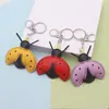 Llavero Divertido y Creativo de Cuero de Insecto Mariquita Lindo Colgante de Bolso Mariquita de Siete Puntos Llavero