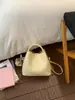 Al por mayor Transfronterizo Popular Moda Nicho Bolso Cubo 2026 Modelo Nuevo Simple Lujo Ligero Bolso de Hombro Cuero Suave Bolso de Mano para Mujeres