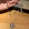 Collar Cruz de Corazón de Perla de Doble Capa para Mujer, Cadena Clavicular en Capas de Lujo Ligero, Diseño de Nicho con un Toque de Alta Gama, Estilo Ins