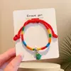 Pulseira de corda colorida zongzi do Festival do Barco-Dragão 2026 novo modelo pulseira trançada artesanal étnica infantil atacado corda vermelha