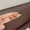 Nuevo estilo diseño único alta calidad lujo ligero esmalte de gota francés pendientes de botón redondos pendientes de temperamento retro nicho femenino femenino