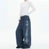 Calça de moletom da moda estilo americano, com estampa marmorizada, perna larga e cordão, para homens e mulheres, apresentando um design solto de perna reta, perfeita para outono e inverno