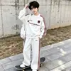 Nuevo Conjunto Deportivo Infantil Primavera y Otoño 2026, Sudadera a Rayas Estilo Universitario Coreano y Pantalones de Pierna Ancha Conjunto de Dos Piezas para Niños y Niñas