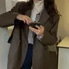 Jaqueta de couro PU feminina de alta qualidade para o início do outono, estilo Dongdaemun coreano, blazer elegante de corte solto com gola e mangas compridas