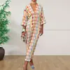 2026 nuevo vestido de verano cruzado europeo y americano para mujer, casual y elegante, versátil, estampado, cuello en V, manga abullonada, corte ajustado