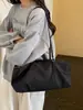Bolso de hombro tipo tote de gran capacidad, diseño de nicho, estilo coreano casual nuevo para cruzar fronteras, bolso de mano de moda para mujer