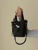 Bolso bandolera de piel suave con patrón de lichi, bolso de mano para mujer, sensación de alta gama, adecuado para el trabajo y los desplazamientos, bolso bandolera pequeño versátil para el teléfono