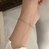 Y33 S37 Versión coreana de Europa y Estados Unidos cadena de calidad de atmósfera fría giro suave acero titanio chapado en oro pulsera fina