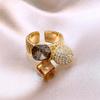 Anillo redondo de circonita galvanizada en oro real con diseño creativo de nicho para el dedo índice, pulsera de lujo ligera y de alta calidad para mujer