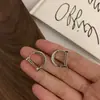 @Procesando Artículo Aretes de Letra Coreana D Estilo Simple Minimalista Diseño de Lujo Ligero Diseño de Nicho Pinzas para Orejas Accesorios para Orejas Cobre