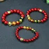 Pulsera de Cinabrio Dios de la Riqueza de Cinco Vías Arena Dorada Púrpura Pulsera Amuleto Genuina para Hombres y Mujeres Año Zodiacal Venta al por mayor de fábrica