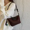 Bolso de ante estilo coreano para debajo del brazo para mujer, nuevo modelo 2026, bolso hobo de alta gama a la moda, bolso versátil de hombro y cruzado