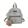 Nuevo Estilo Galleta Guiñando Colgante de Felpa Oscilante Encanto para Bolsos Lindo Accesorio para Mochila Llavero Colgante Pequeño