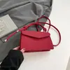 Bolsas listradas de nicho para mulheres, design de nicho estiloso, bolsas de mão 2025 moda tendência, bolsa quadrada pequena de ombro e transversal para o dia a dia