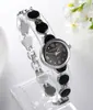 Reloj de pulsera negro al por mayor, reloj de moda informal coreano para mujer, reloj de regalo con movimiento 68, agente mayorista