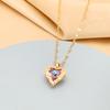 Collar de acero de titanio con colgante de corazón de océano colorido para mujer, versión coreana de lujo ligero, cadena de clavícula para novias, fabricantes de joyas al por mayor