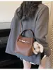 Bolso retro de moda para mujer, nuevo modelo primavera 2026, bolso de hombro y cruzado casual versátil de alta gama