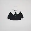 Outono de 2026 Novo Estilo Coreano Camisa Feminina de Algodão Puro Color Block Gola Boneca Manga Longa Bebê Gola de Renda Top Solto