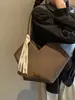 Bolsa Grande Transfronteiriça para Mulheres 2025 Nova Moda Outono e Inverno Bolsa de Ombro de Mão Texturizada para o Dia a Dia Bolsa Tote