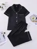 Comercio Electrónico Transfronterizo Europeo y Americano Cárdigan de Pijama Negro Satín Solapa Manga Corta Pantalón Largo Conjunto de Ropa para el Hogar para Mujer Venta al por Mayor