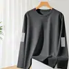 Temporada de primavera y otoño, camiseta lisa popular de manga larga, corte holgado, cuello redondo, unisex, top simple y versátil